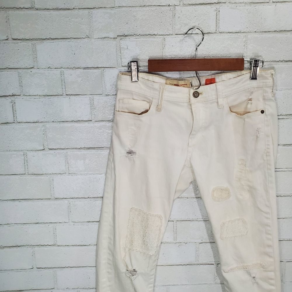 Women's Distressed White Patch Jeans - Picture 2 of 16